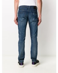 dunkelblaue Jeans mit Destroyed-Effekten von Diesel