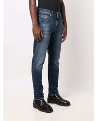 dunkelblaue Jeans mit Destroyed-Effekten von 7 For All Mankind