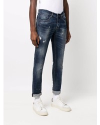 dunkelblaue Jeans mit Destroyed-Effekten von Dondup