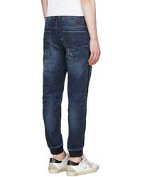 dunkelblaue Jeans mit Destroyed-Effekten von Diesel