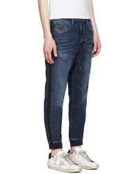 dunkelblaue Jeans mit Destroyed-Effekten von Diesel