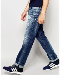 dunkelblaue Jeans mit Destroyed-Effekten von Diesel