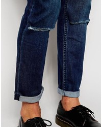 dunkelblaue Jeans mit Destroyed-Effekten von Cheap Monday