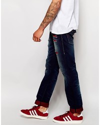 dunkelblaue Jeans mit Destroyed-Effekten von True Religion