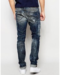 dunkelblaue Jeans mit Destroyed-Effekten von Diesel