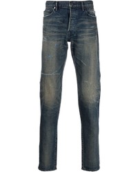 dunkelblaue Jeans mit Destroyed-Effekten von John Elliott