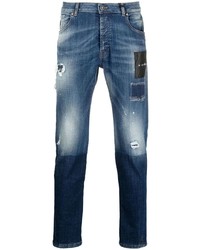 dunkelblaue Jeans mit Destroyed-Effekten von John Richmond