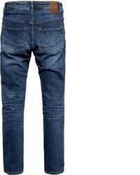 dunkelblaue Jeans mit Destroyed-Effekten von King Kerosin