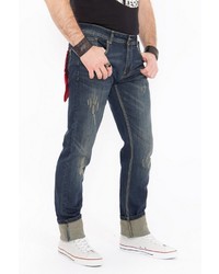 dunkelblaue Jeans mit Destroyed-Effekten von KINGKEROSIN