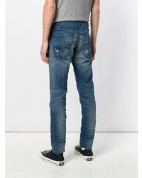 dunkelblaue Jeans mit Destroyed-Effekten von Diesel