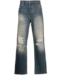 dunkelblaue Jeans mit Destroyed-Effekten von Ksubi