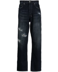 dunkelblaue Jeans mit Destroyed-Effekten von Ksubi