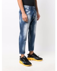 dunkelblaue Jeans mit Destroyed-Effekten von Philipp Plein