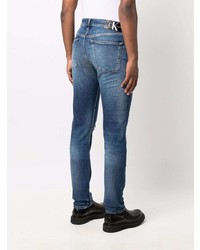 dunkelblaue Jeans mit Destroyed-Effekten von Calvin Klein Jeans