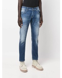 dunkelblaue Jeans mit Destroyed-Effekten von Dondup