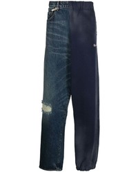 dunkelblaue Jeans mit Destroyed-Effekten von Maison Mihara Yasuhiro