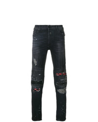 dunkelblaue Jeans mit Destroyed-Effekten von Marcelo Burlon County of Milan