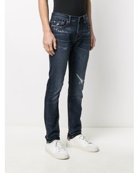 dunkelblaue Jeans mit Destroyed-Effekten von 7 For All Mankind