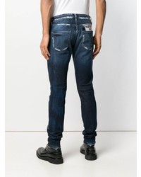 dunkelblaue Jeans mit Destroyed-Effekten von Philipp Plein