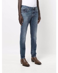 dunkelblaue Jeans mit Destroyed-Effekten von John Richmond