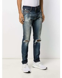 dunkelblaue Jeans mit Destroyed-Effekten von Diesel