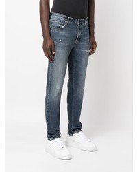 dunkelblaue Jeans mit Destroyed-Effekten von Haikure