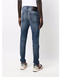 dunkelblaue Jeans mit Destroyed-Effekten von Diesel