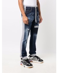 dunkelblaue Jeans mit Destroyed-Effekten von Philipp Plein