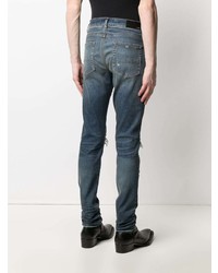 dunkelblaue Jeans mit Destroyed-Effekten von Amiri