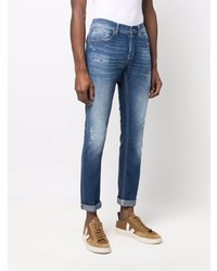 dunkelblaue Jeans mit Destroyed-Effekten von Dondup