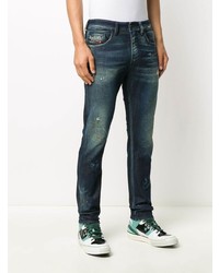 dunkelblaue Jeans mit Destroyed-Effekten von Diesel