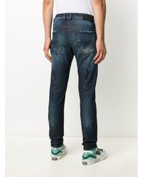 dunkelblaue Jeans mit Destroyed-Effekten von Diesel