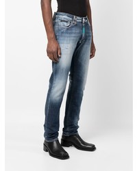 dunkelblaue Jeans mit Destroyed-Effekten von Philipp Plein