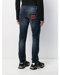 dunkelblaue Jeans mit Destroyed-Effekten von Philipp Plein