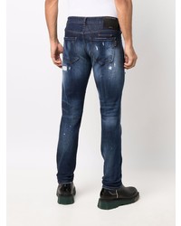 dunkelblaue Jeans mit Destroyed-Effekten von Philipp Plein