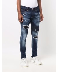 dunkelblaue Jeans mit Destroyed-Effekten von Philipp Plein