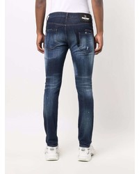 dunkelblaue Jeans mit Destroyed-Effekten von Philipp Plein