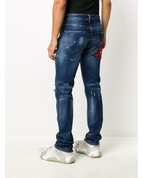 dunkelblaue Jeans mit Destroyed-Effekten von Philipp Plein