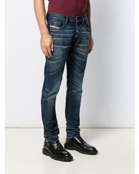 dunkelblaue Jeans mit Destroyed-Effekten von Diesel