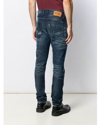 dunkelblaue Jeans mit Destroyed-Effekten von Diesel