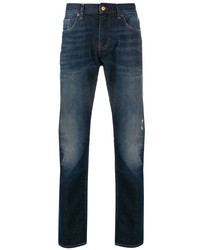 dunkelblaue Jeans mit Destroyed-Effekten von Tommy Hilfiger