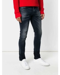 dunkelblaue Jeans mit Destroyed-Effekten von Dondup