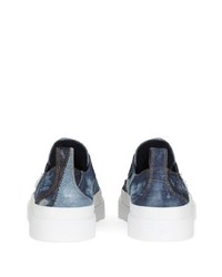 dunkelblaue Jeans niedrige Sneakers von Dolce & Gabbana