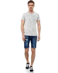 dunkelblaue Jeansshorts mit Destroyed-Effekten von RUSTY NEAL