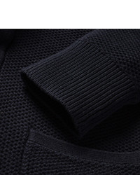 dunkelblaue Strickjacke mit einem Schalkragen