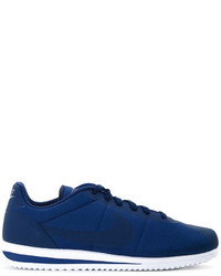 dunkelblaue Turnschuhe von Nike