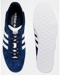 dunkelblaue Turnschuhe von adidas