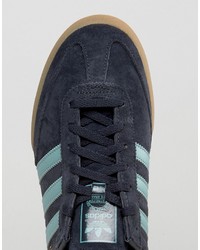 dunkelblaue Turnschuhe von adidas