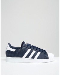 dunkelblaue Turnschuhe von adidas