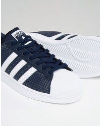 dunkelblaue Turnschuhe von adidas